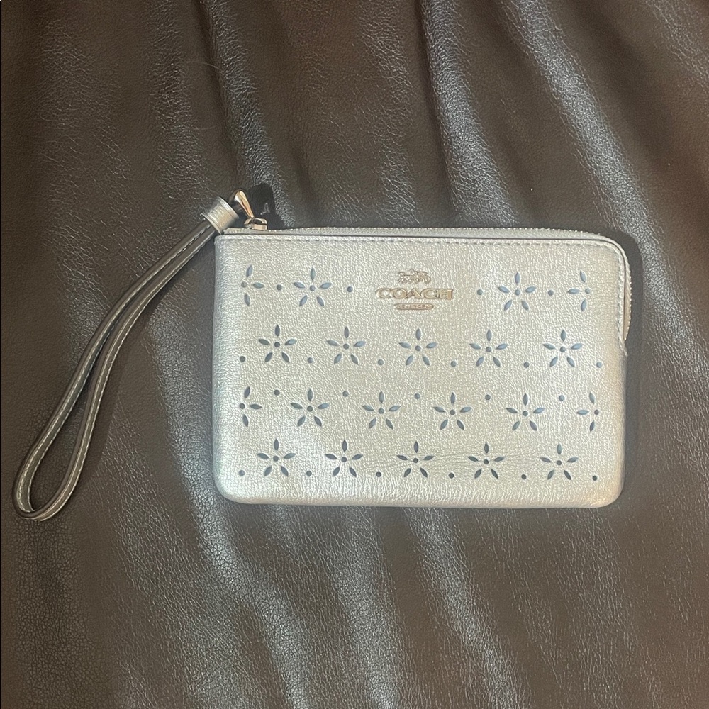 Coach Metallic Wristlet with Star Cutouts